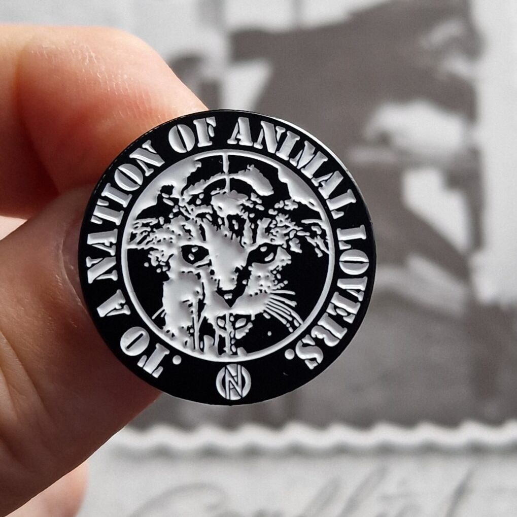 conflict-to-a-nation-of-animal-lovers-pin-s-mail-25mm image 1