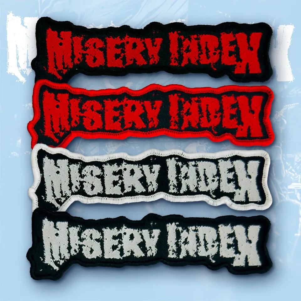 misery-index-logo-cusson-tiss-bordure-blanche image 1