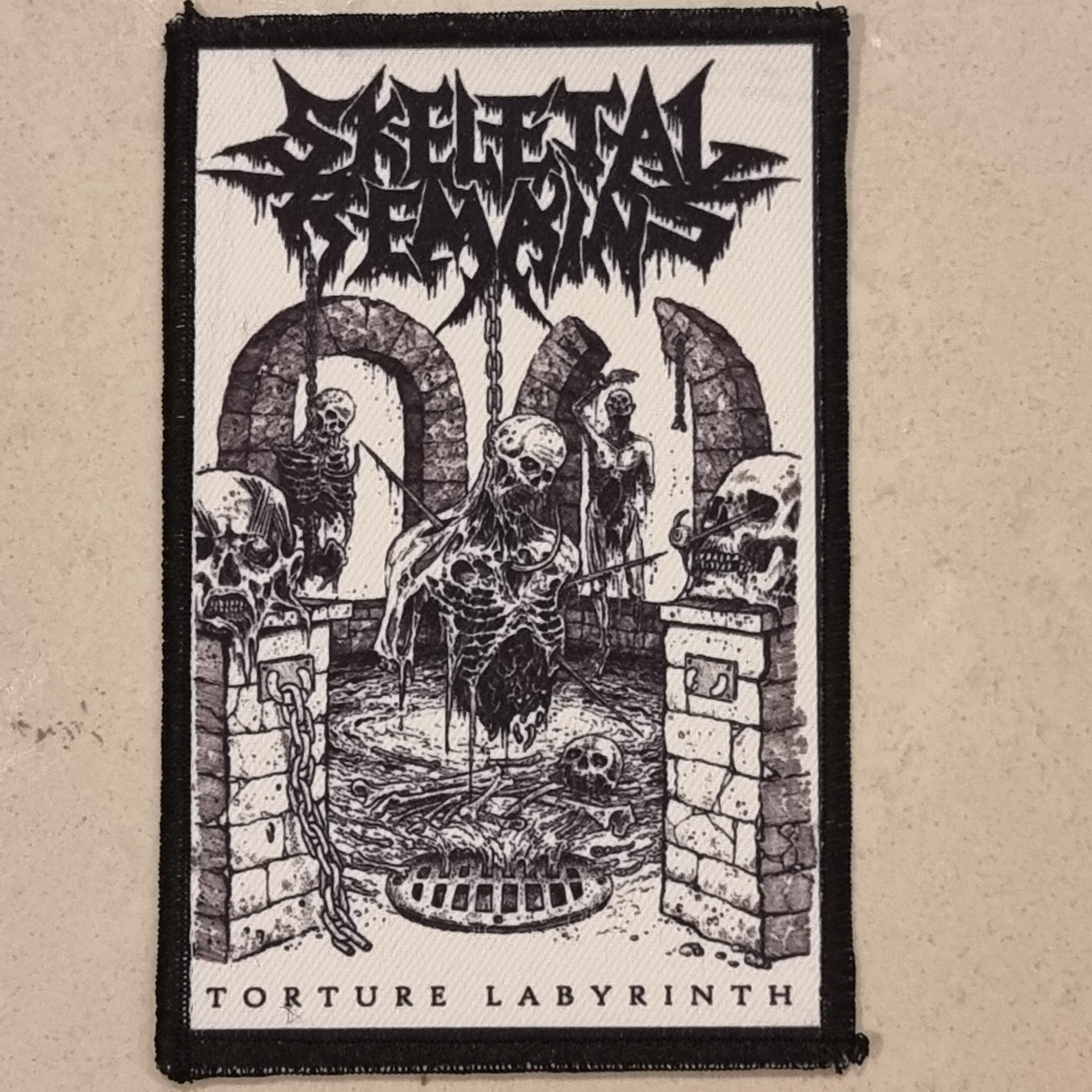skeletal-remains-torture-labyrinth-patch-cusson image 1