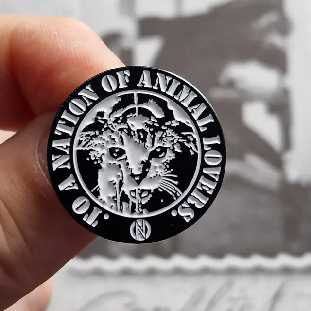 conflict-to-a-nation-of-animal-lovers-pin-s-mail-25mm image 1
