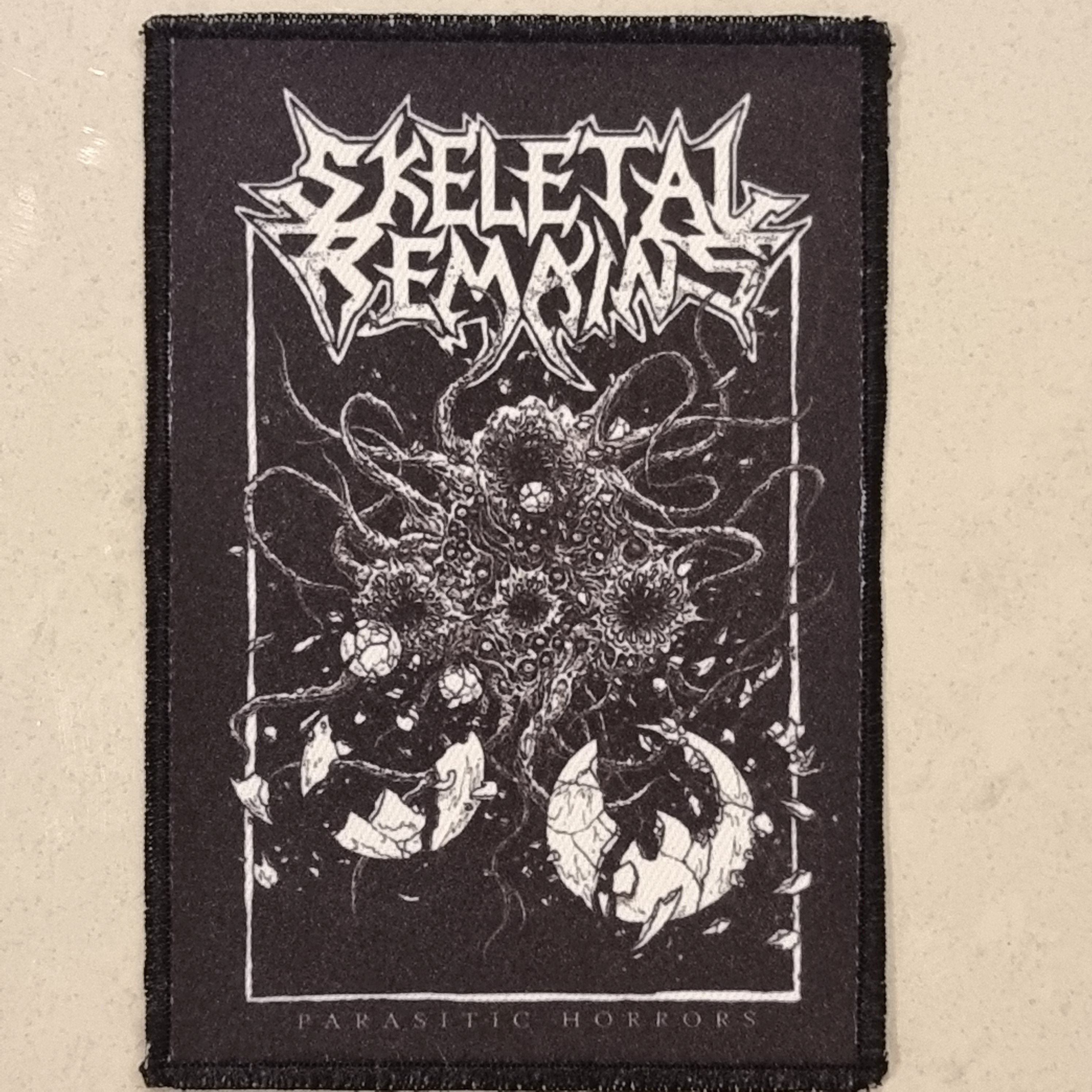 skeletal-remains-parasitic-horrors-patch-metal image 1